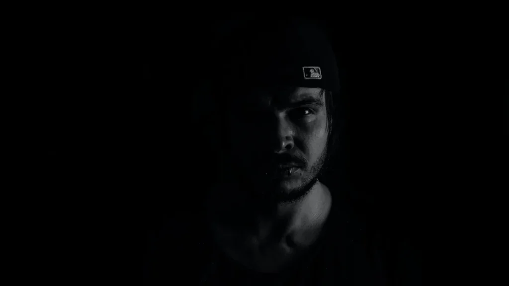 Male face in dark