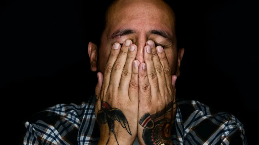 Man Feeling Overwhelmed