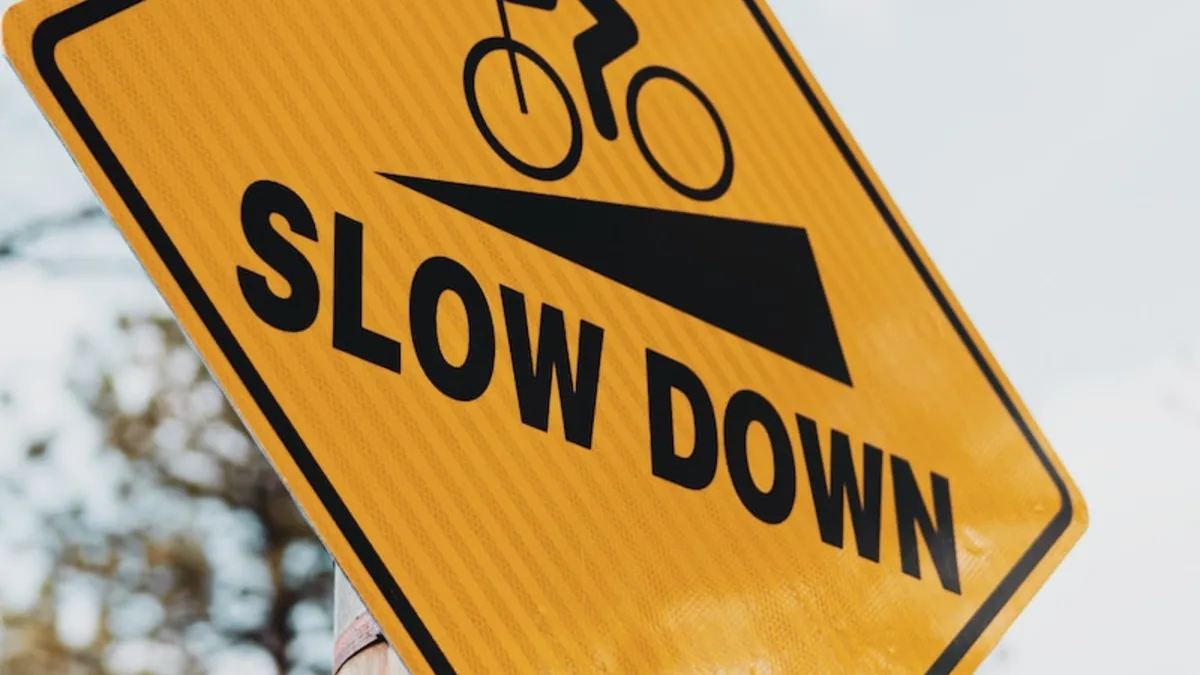 Slow down sign