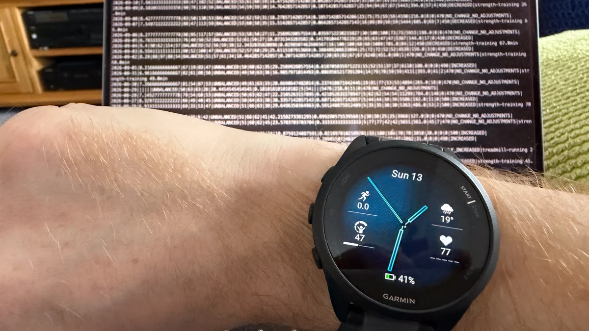 Garmin watch infront of a database